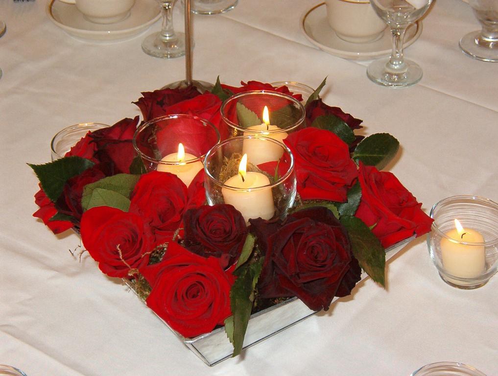 Red rose candle Centerpiece from K.C. Floral & Design in Lockport, IL 60441